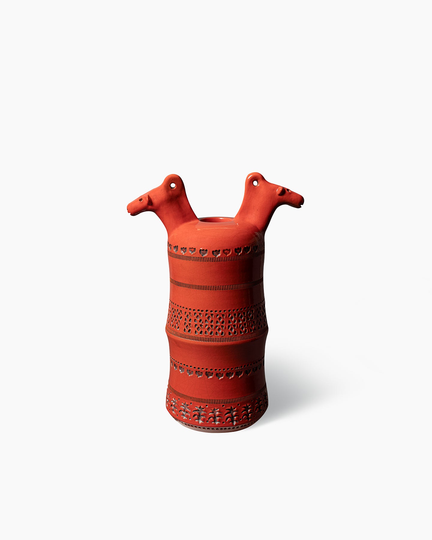 Vase with horse figures.