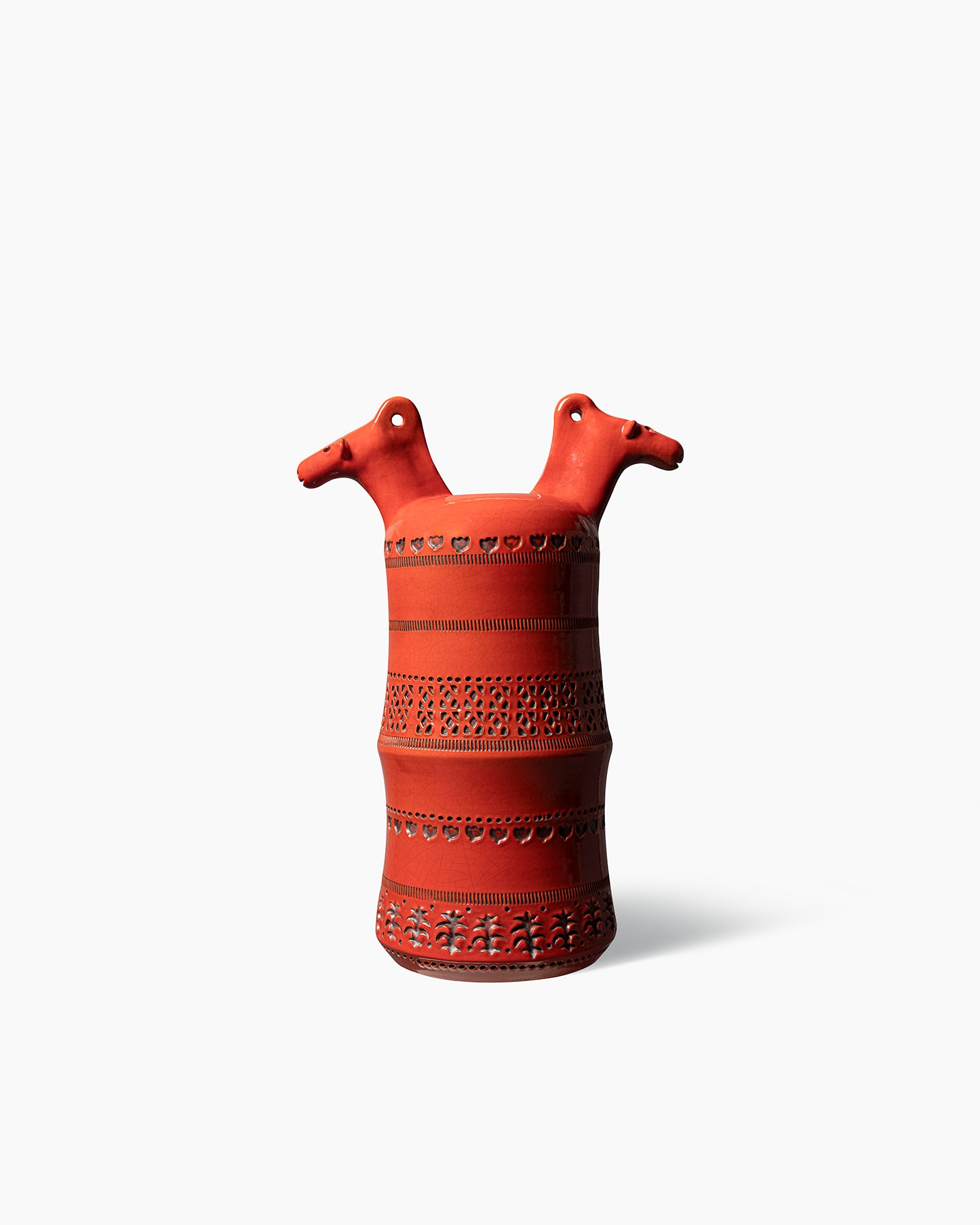 Vase with horse figures.