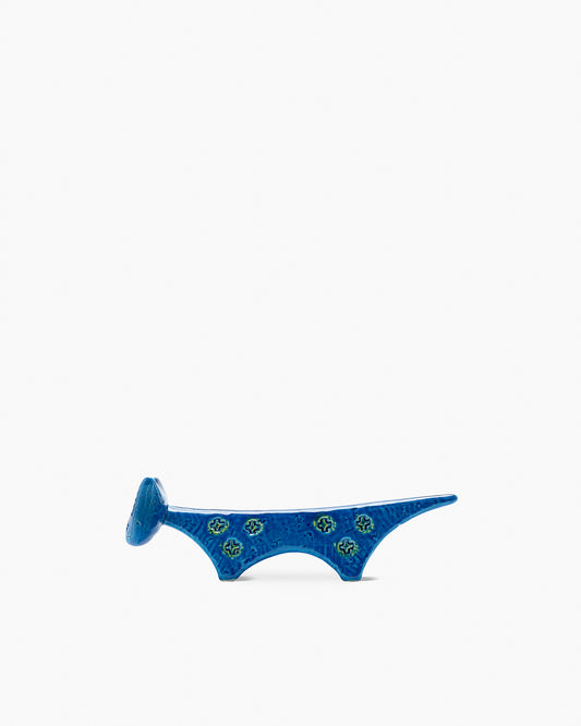 Figura di gatto con muso triangolare
